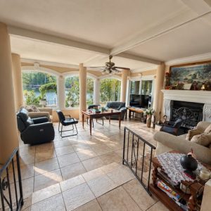 Sunroom with lake view at Mary's Place